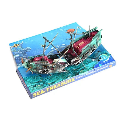 Model ship on a blue box with ocean design