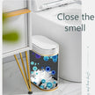 White trash bin with blue and purple graphics of germs, labeled 'Close the smell', on a light gray background.