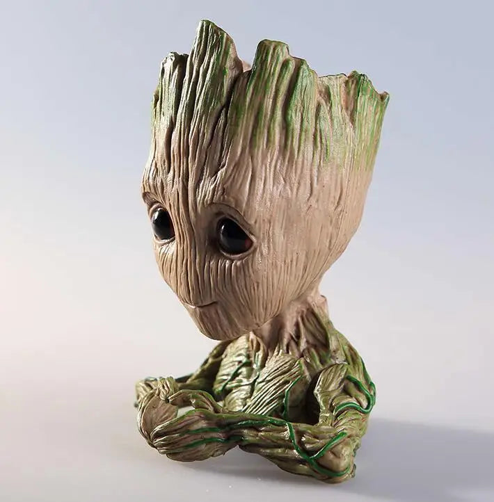 Tree-like creature with a face on a white background