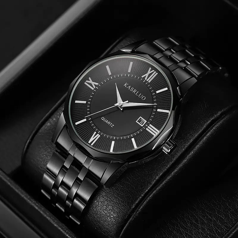 Black wristwatch with Roman numeral markers on a dark background