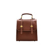 Brown leather handbag with gold buttons on a white background