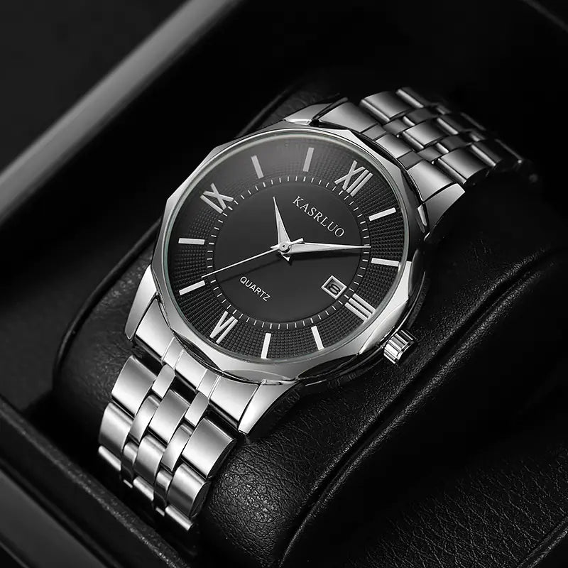 Silver wristwatch with black dial on a dark background