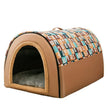 Pet house with patterned roof and beige base on a white background