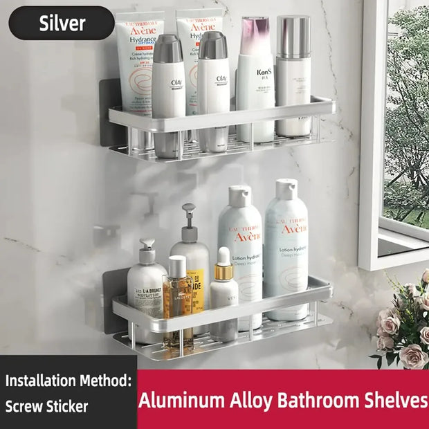 Aluminum alloy bathroom shelves with toiletries on a marble wall.