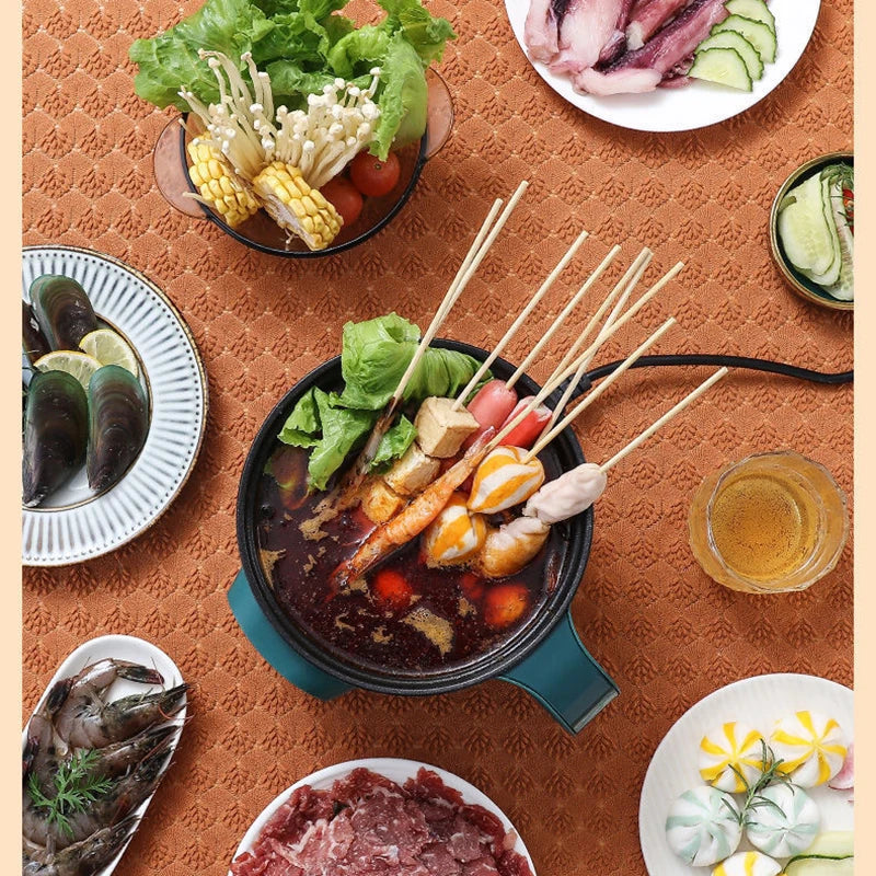 Assorted skewered dishes and ingredients on a textured surface