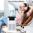 Woman relaxing with headphones, Aromatherapy Diffuser, and essential oils on a table.