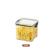 Clear container with yellow cereal, 700ML label on a white background