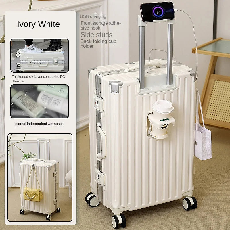 White suitcase with multiple compartments and features on a neutral background