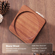Wooden coaster with specifications on a wooden surface