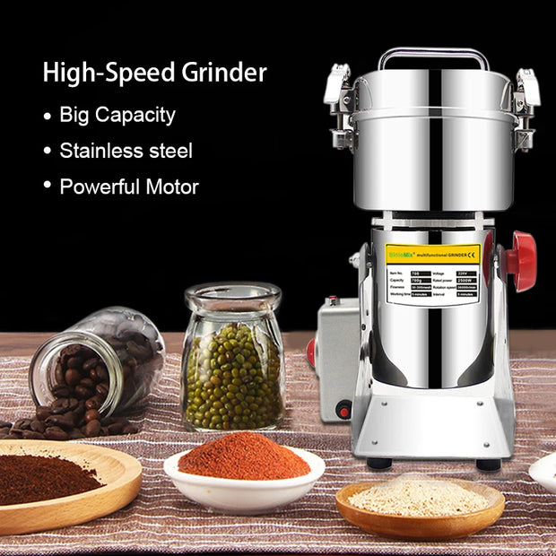 High-speed grinder with ingredients and products on a table