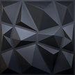 Geometric pattern of black and gray triangles on a dark background