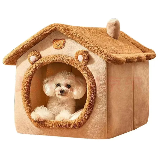 Small white dog inside a beige pet house with a teddy bear design on a white background