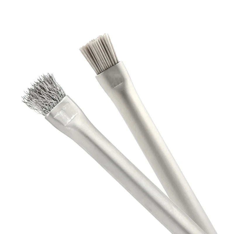 Two white pastry brushes with bristle heads on a white background