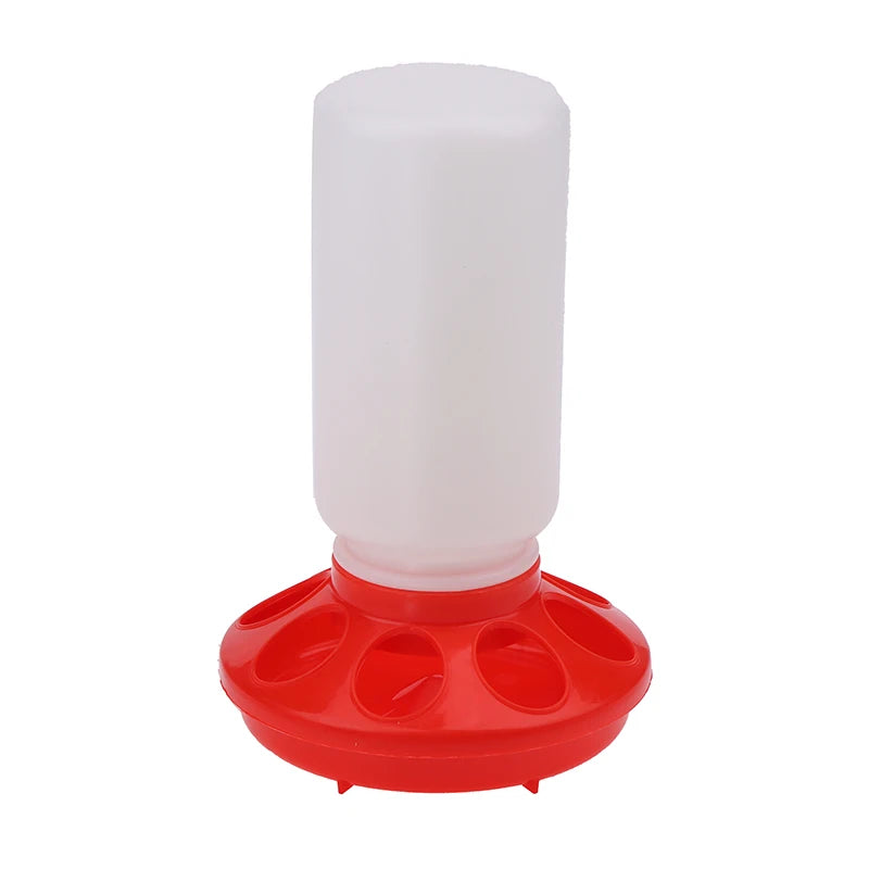 Red and white plastic chicken feeder on a white background