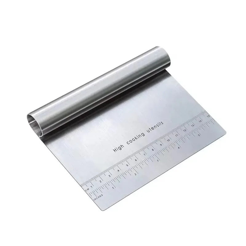 Roll of metal baking paper with a ruler on a white background
