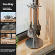 Stainless steel kitchen utensil holder with features highlighted on the left, placed indoors.