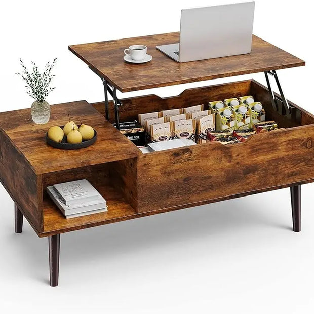 Wooden coffee table with lift-top design, displaying a laptop and other items on a white background.