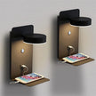 Two wall-mounted lamps with built-in charging ports for smartphones on a gray background.