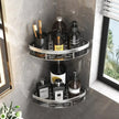 Corner shower caddy with various bottles and toiletries on a tiled bathroom wall.