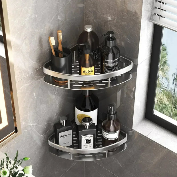 Corner shower caddy with various bottles and toiletries on a tiled bathroom wall.