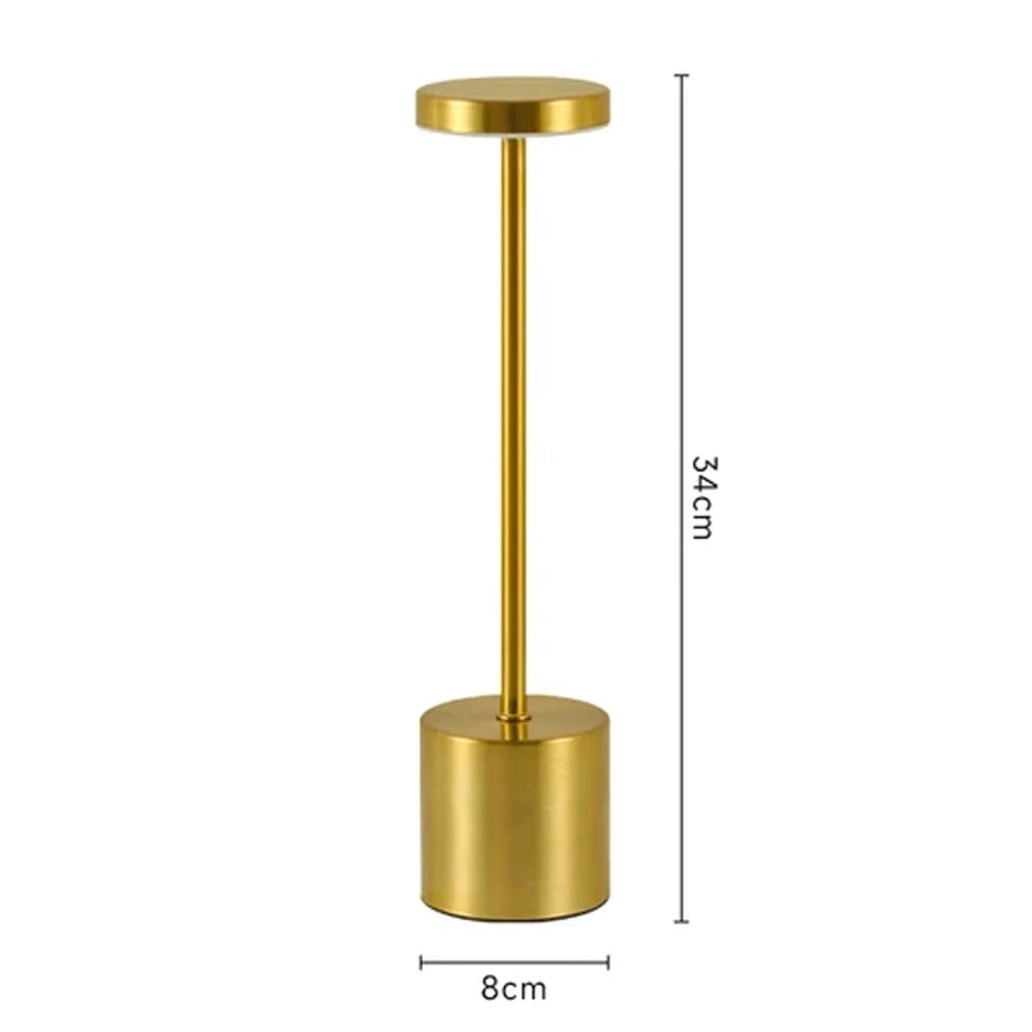 Gold cylindrical object with dimensions on a white background