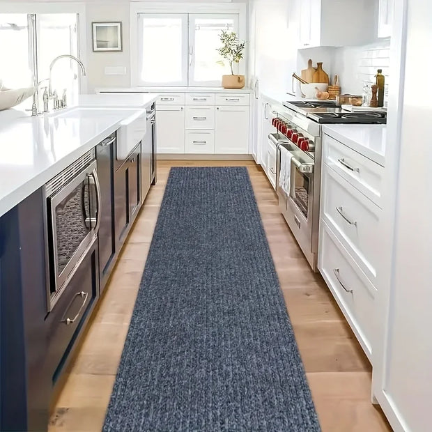 Modern kitchen with a long blue runner on the floor