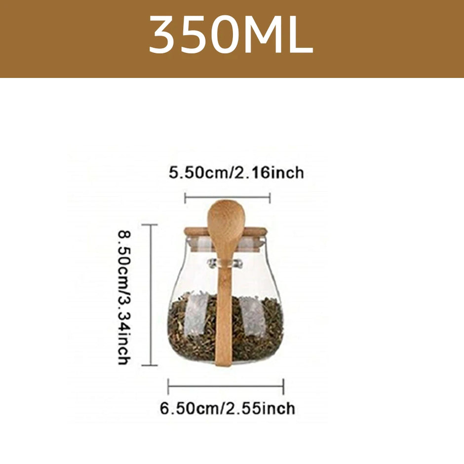 Glass jar with wooden spoon and tea bags, labeled 350ML with dimensions on a white background.