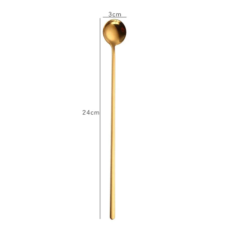Gold spoon with measurements on a white background