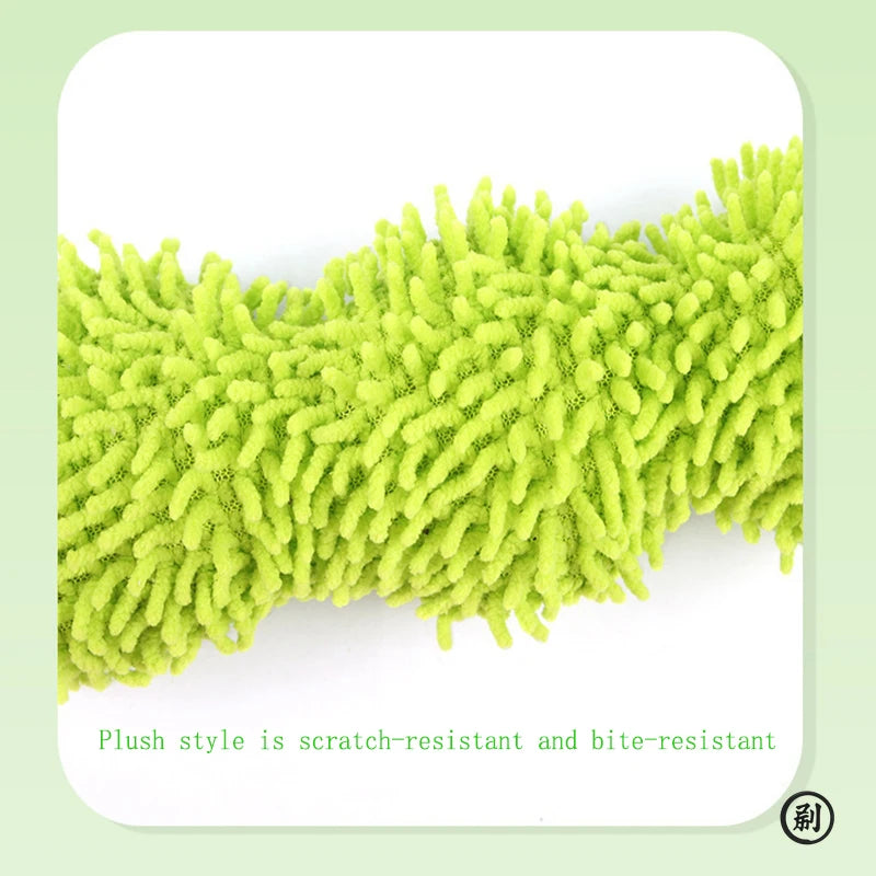 Green plush pet toy on a white background with text indicating scratch-resistance and bite-resistance.