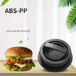 Hamburger press with a hamburger on a wooden surface, against a white curtain background.