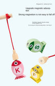 Colorful magnetic fishing toys with wooden handles on a white background