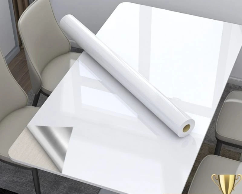 Roll of white paper on a table with chairs in a room setting
