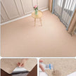 Beige carpet in a room with a small table and flowers, followed by close-ups of the carpet's texture and water resistance.