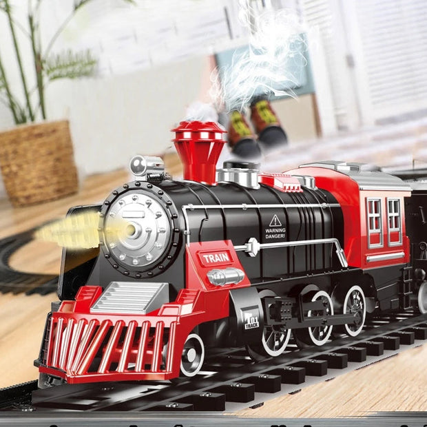 Toy train with red and black engine on tracks in a room setting