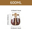 Glass jar with wooden spoon and tea bags, labeled 600ML with dimensions on a white background.