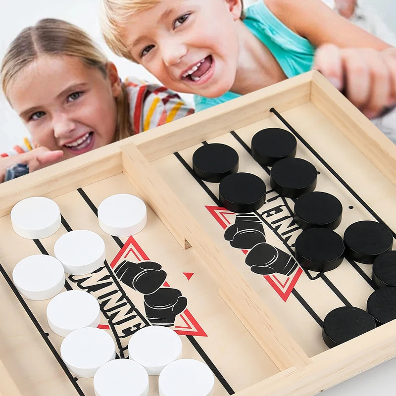 Children playing with a wooden checkers game set