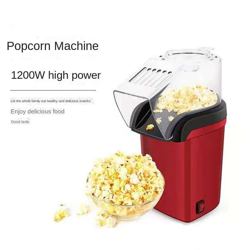 Red popcorn machine with a bowl of popcorn on a white background