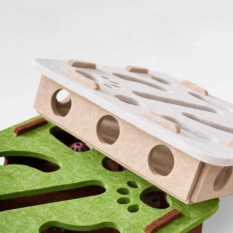 Wooden and green puzzle pieces on a white background