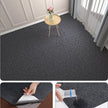 Gray carpet with a small table and flowers, followed by close-ups of applying a product to the carpet.