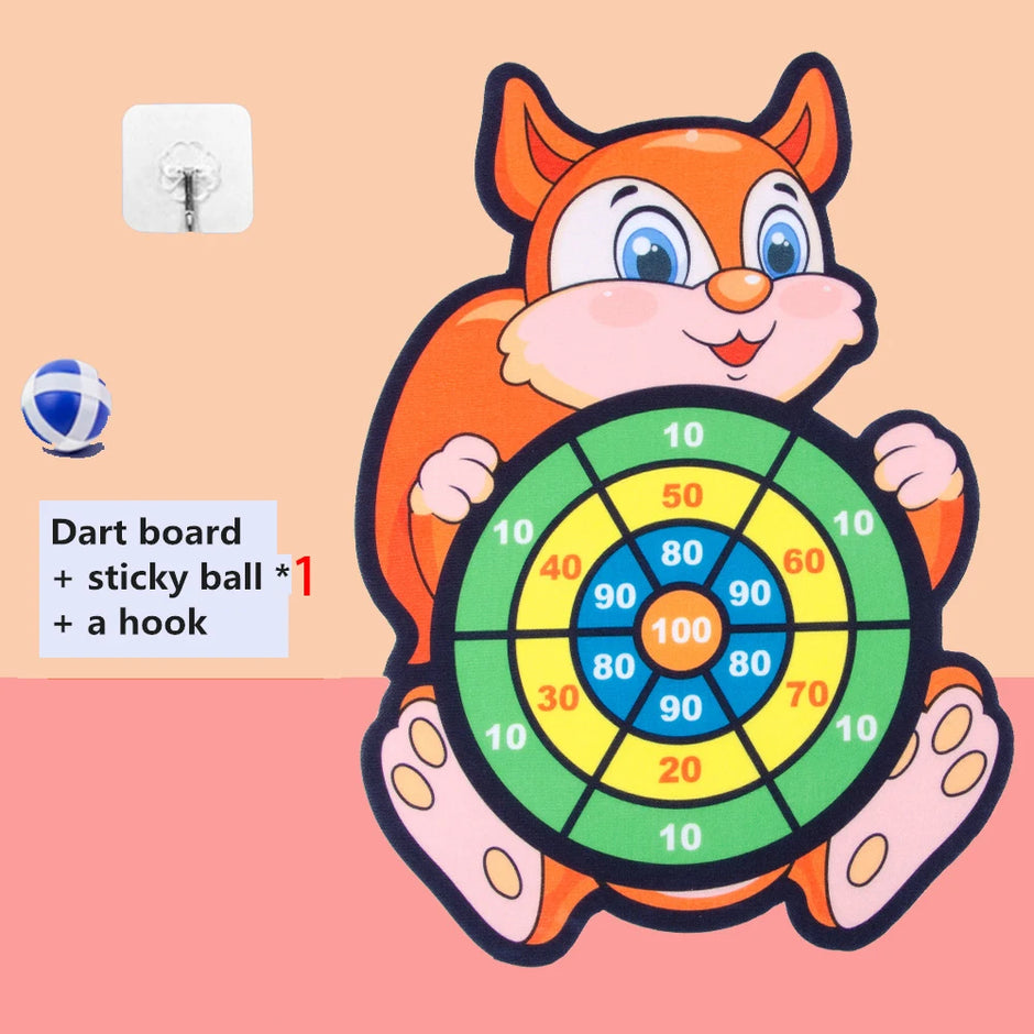 Children's dart board with cartoon fox design on a pink background