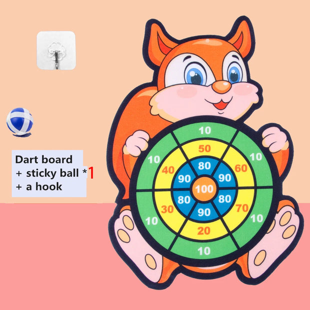 Children's dart board with cartoon fox design on a pink background