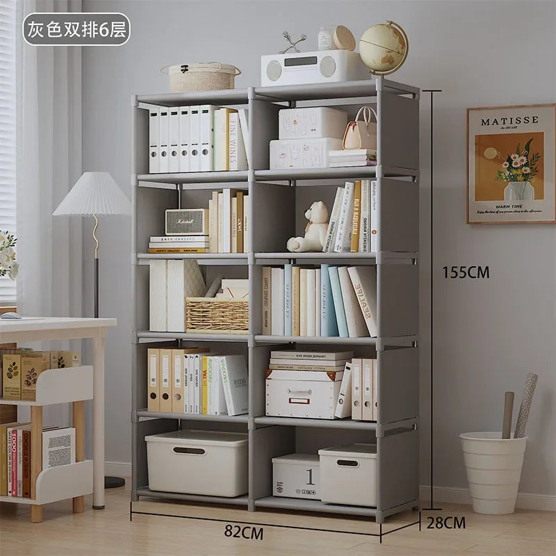 Gray bookshelf with books and decor items in a room setting