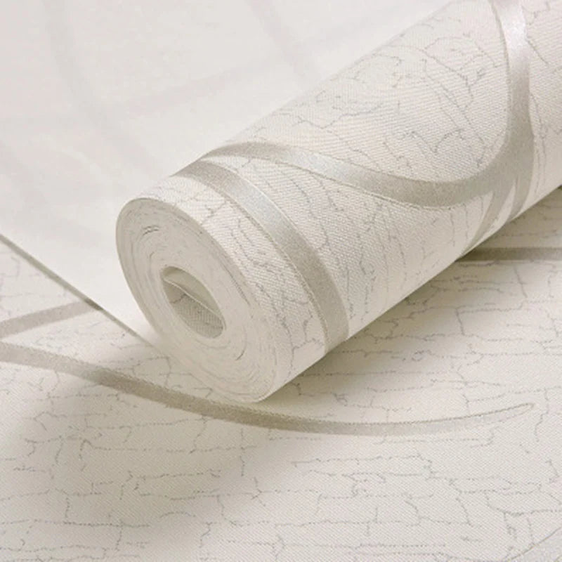 Roll of white textured wallpaper on a matching background