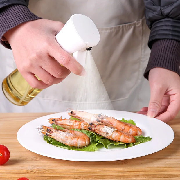 Person seasoning shrimp on a plate with a white spray bottle.