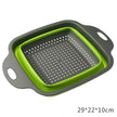 Collapsible colander with green interior and gray exterior on a white background
