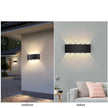 Black wall light fixture shown outdoors and indoors on a white background.