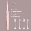 Pink electric toothbrush with replacement heads and packaging details on a beige background