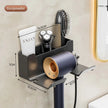 Wall-mounted hair care station with dimensions labeled, featuring a hair dryer, shaver, and other tools.