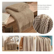 Beige textured blanket shown in various settings with close-up details.