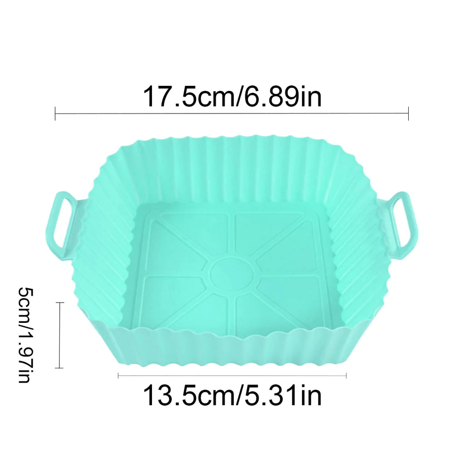 Turquoise silicone baking mold with dimensions on a white background